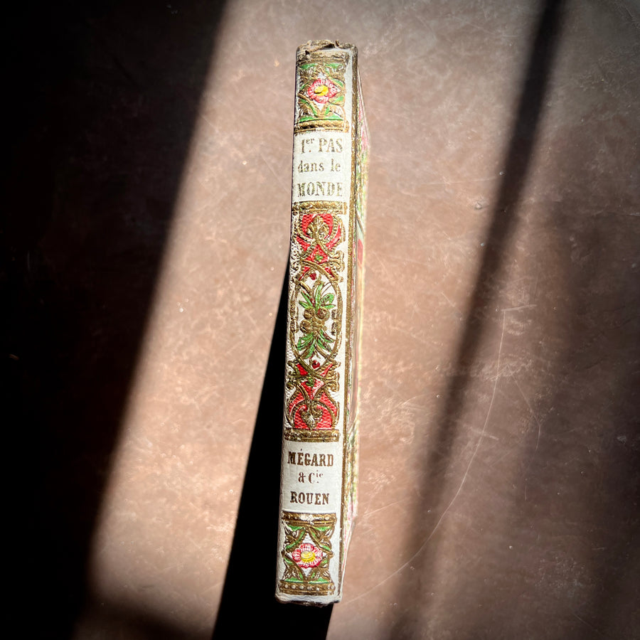 Le Premier Pas dans le Monde: Leçons de Politesse by C. Fallet | 1856 | Cartonnage Romantique with Illustrated Front Board & Ornate Pink, White & Gold Back Board