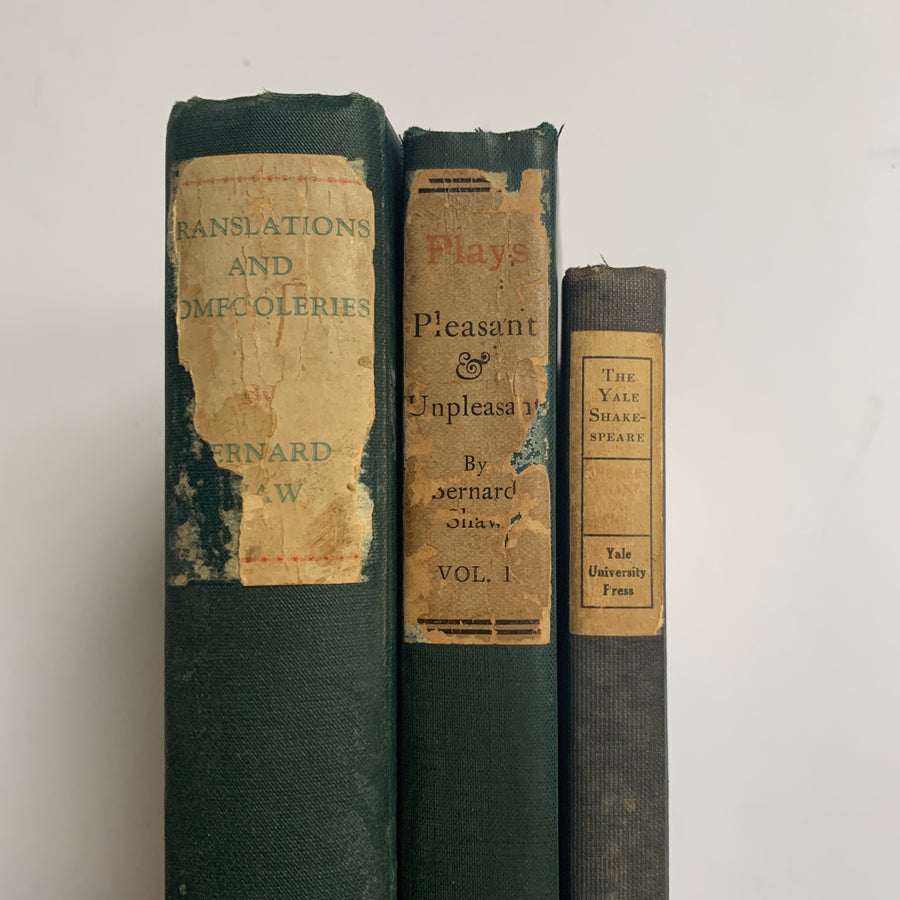 Distressed Collection of Old Books in Muted Colors