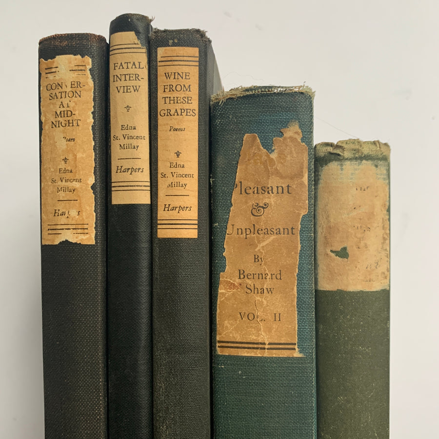 Distressed Collection of Old Books in Muted Colors